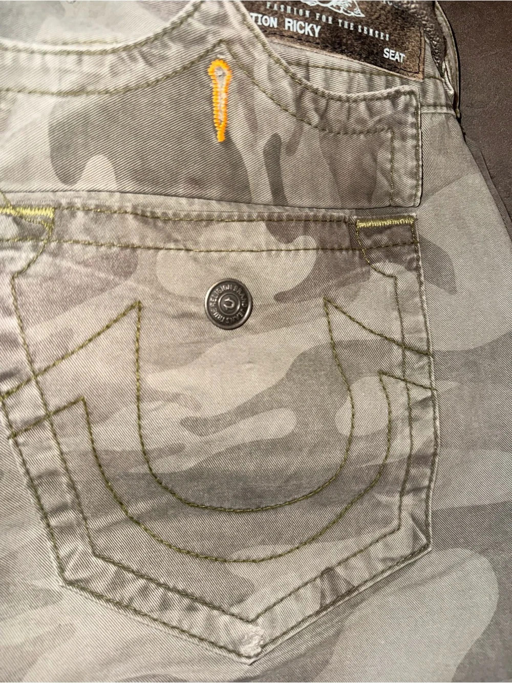 True Religion Jeans Tag Detail in Olive with Orange Stitching